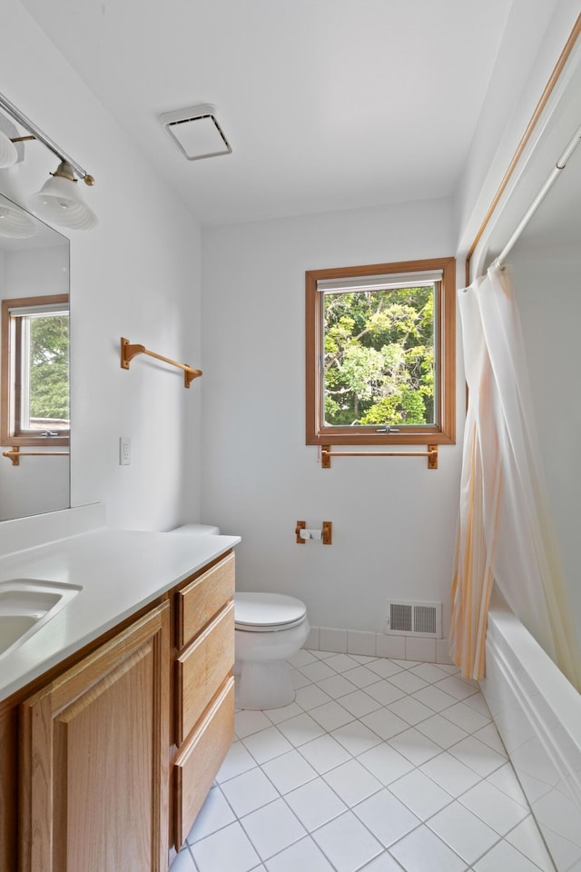 7184 Steeplechase Dr, Saline, MI 48176 - full bath featuring vanity, tile patterned flooring, and shower / tub combo with curtain