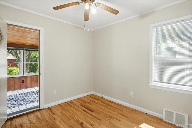 14888 Belmont Ave, Southgate, MI 48101 - unfurnished room with light wood-style flooring, crown molding, healthy amount of natural light, and a ceiling fan