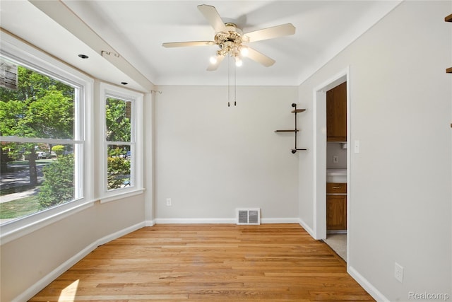 14888 Belmont Ave, Southgate, MI 48101 - spare room featuring healthy amount of natural light, light wood-style flooring, and a ceiling fan