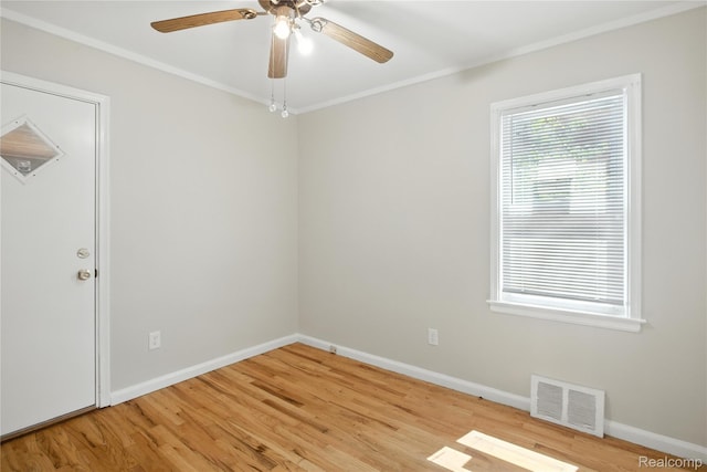 14888 Belmont Ave, Southgate, MI 48101 - spare room featuring ornamental molding, light wood finished floors, and ceiling fan