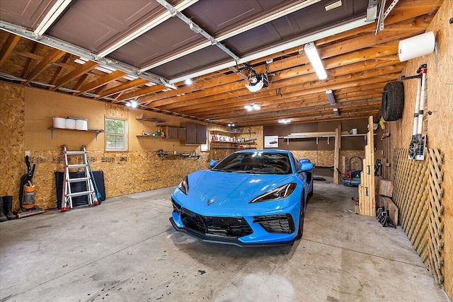 9950 Carpenter Rd, Milan, MI 48160 - garage with a garage door opener