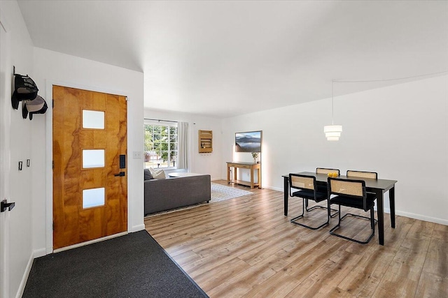 9950 Carpenter Rd, Milan, MI 48160 - foyer entrance featuring light wood-style flooring and baseboards