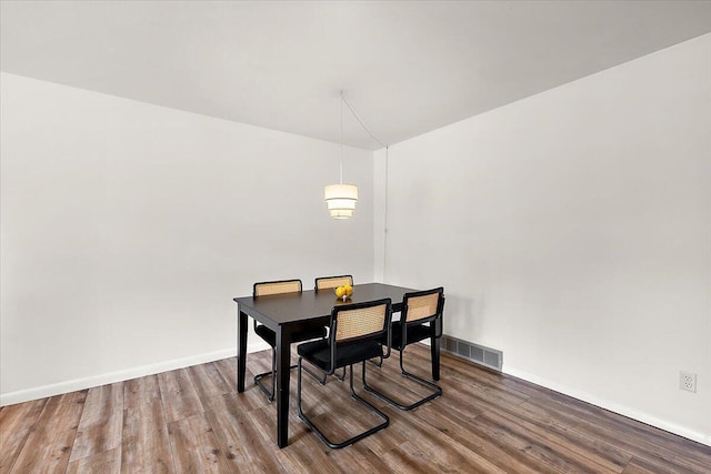 9950 Carpenter Rd, Milan, MI 48160 - dining area with wood finished floors and baseboards