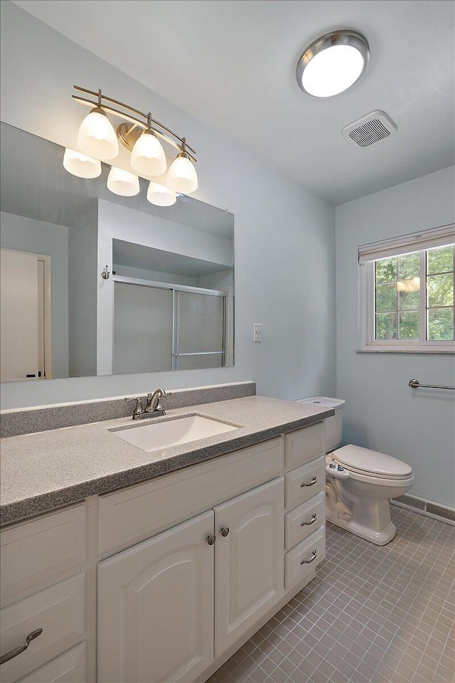 9950 Carpenter Rd, Milan, MI 48160 - bathroom with vanity, an enclosed shower, and tile patterned flooring