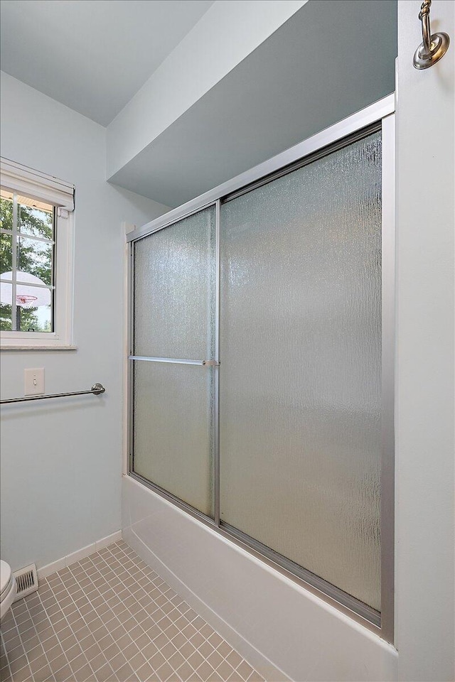 9950 Carpenter Rd, Milan, MI 48160 - bathroom featuring bath / shower combo with glass door and toilet
