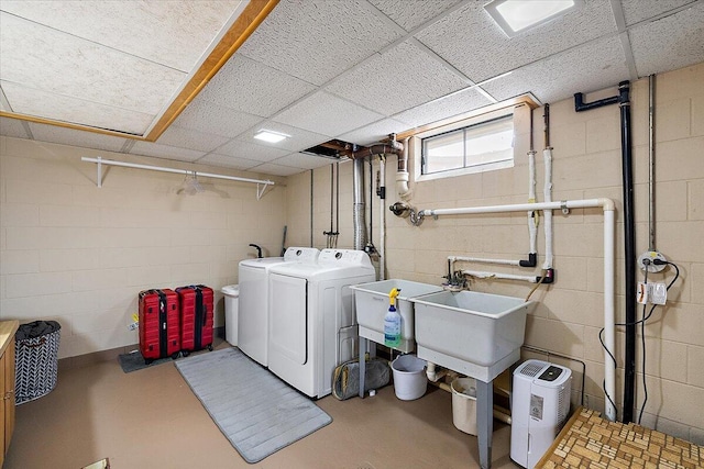 9950 Carpenter Rd, Milan, MI 48160 - washroom with washing machine and dryer and concrete block wall