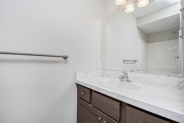 7457 Traditional Ct, Caledonia, MI 49316 - full bath featuring vanity and a shower