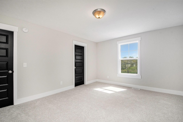 7457 Traditional Ct, Caledonia, MI 49316 - unfurnished room with carpet and a smoke detector