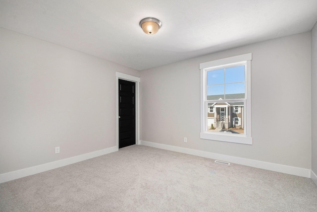 7457 Traditional Ct, Caledonia, MI 49316 - empty room with light colored carpet