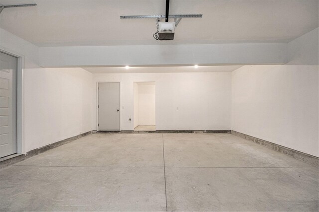 7457 Traditional Ct, Caledonia, MI 49316 - garage with a garage door opener