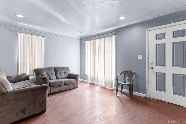 16934 Pembroke Ave, Detroit, MI 48235 - living room with wood finished floors and recessed lighting