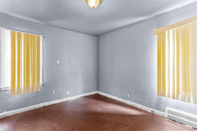 16934 Pembroke Ave, Detroit, MI 48235 - empty room with baseboards and wood finished floors