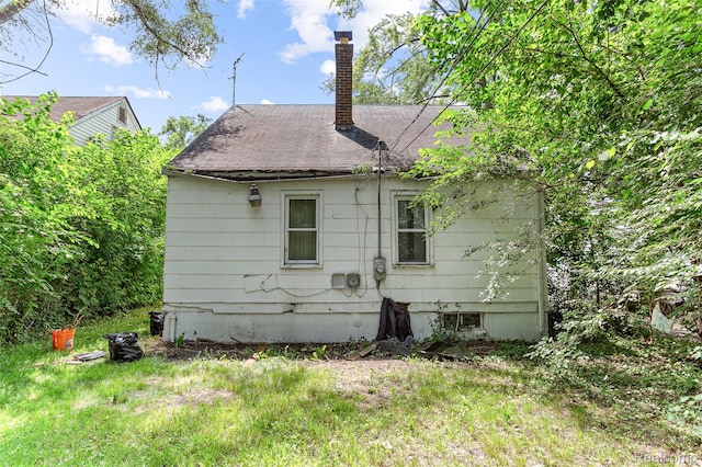 16934 Pembroke Ave, Detroit, MI 48235 - back of house featuring a chimney