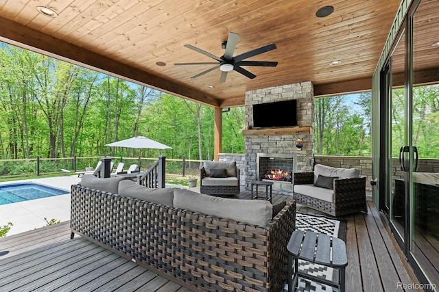 4286 Center Rd, Linden, MI 48451 - wooden terrace with an outdoor living space with a fireplace and a ceiling fan