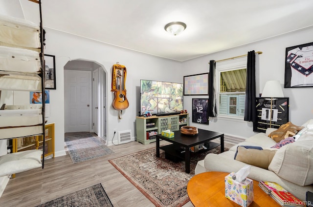 15042 Charles R Ave, Eastpointe, MI 48021 - living area featuring arched walkways and wood finished floors