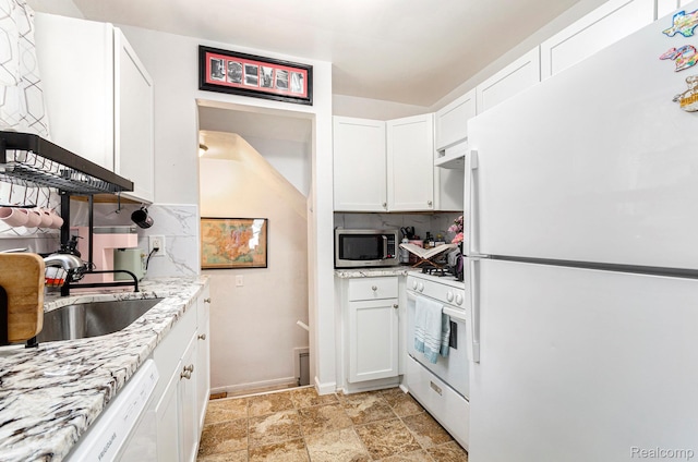15042 Charles R Ave, Eastpointe, MI 48021 - kitchen featuring white appliances, decorative backsplash, white cabinetry, light stone countertops, and light stone finish flooring