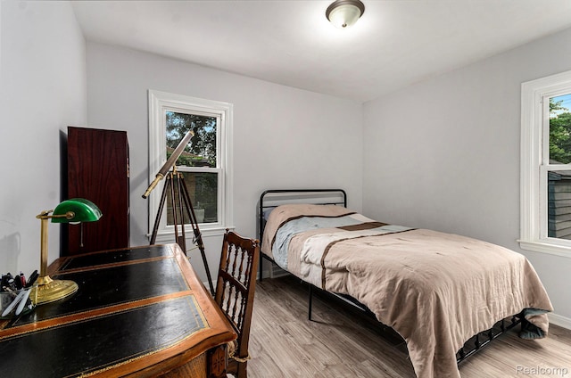 15042 Charles R Ave, Eastpointe, MI 48021 - bedroom featuring wood finished floors and baseboards