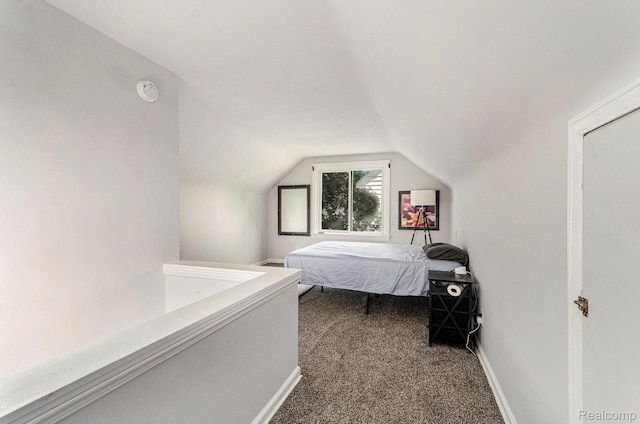 15042 Charles R Ave, Eastpointe, MI 48021 - carpeted bedroom with vaulted ceiling and baseboards