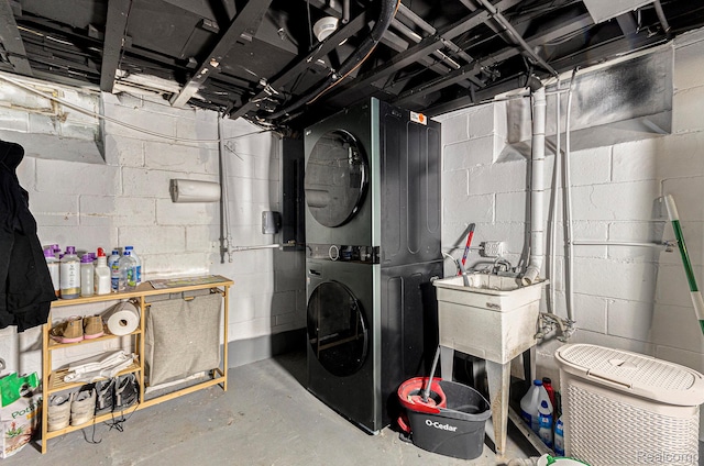15042 Charles R Ave, Eastpointe, MI 48021 - unfinished below grade area with stacked washer / drying machine and a sink