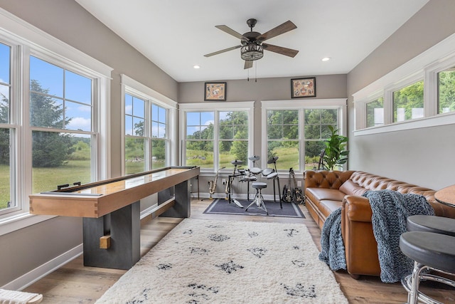 8608 52nd St SE, Ada, MI 49301 - sunroom / solarium with plenty of natural light, wood finished floors, and recessed lighting