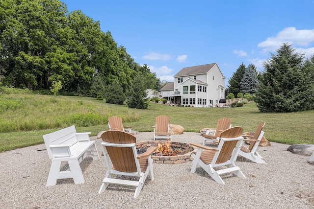 8608 52nd St SE, Ada, MI 49301 - view of patio / terrace with a fire pit