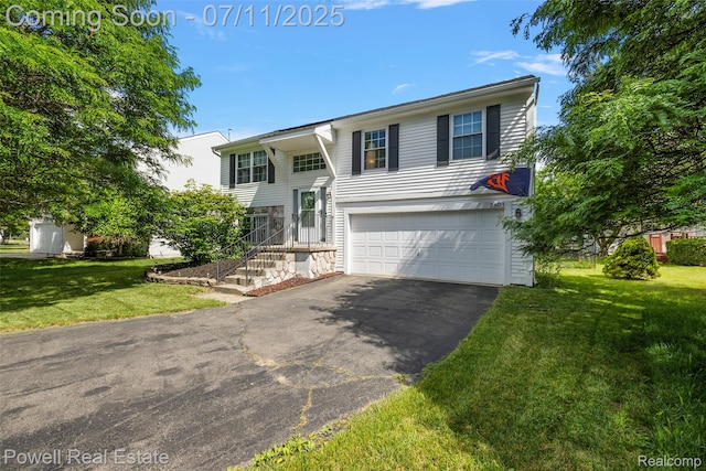 2601 Eardman Ct, Westland, MI 48186 - bi-level home featuring an attached garage, driveway, and a front lawn