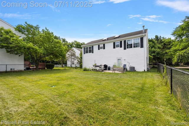 2601 Eardman Ct, Westland, MI 48186 - back of property with a fenced backyard and a patio
