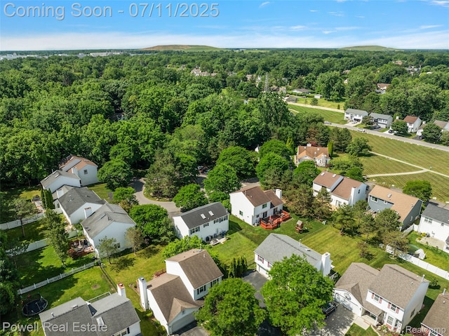 2601 Eardman Ct, Westland, MI 48186 - aerial view of property's location featuring nearby suburban area and a heavily wooded area