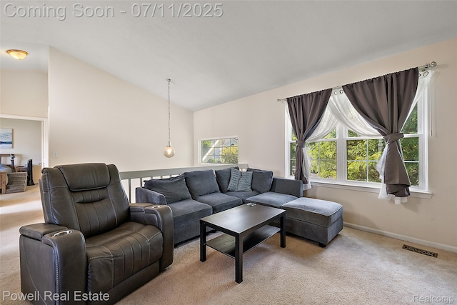 2601 Eardman Ct, Westland, MI 48186 - carpeted living room featuring lofted ceiling and baseboards