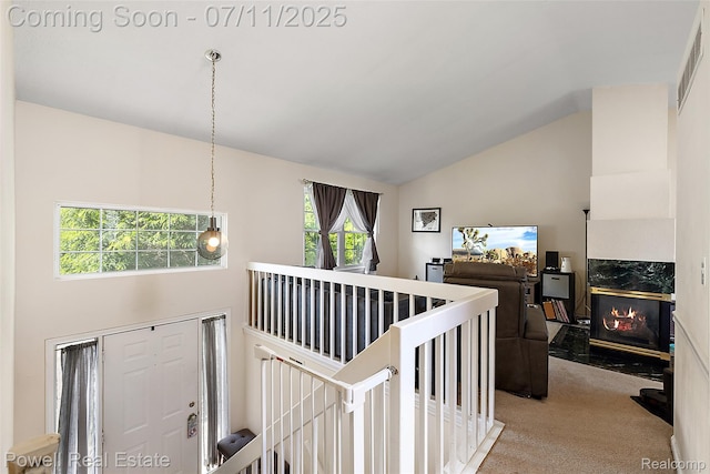 2601 Eardman Ct, Westland, MI 48186 - hallway featuring an upstairs landing, carpet flooring, and lofted ceiling