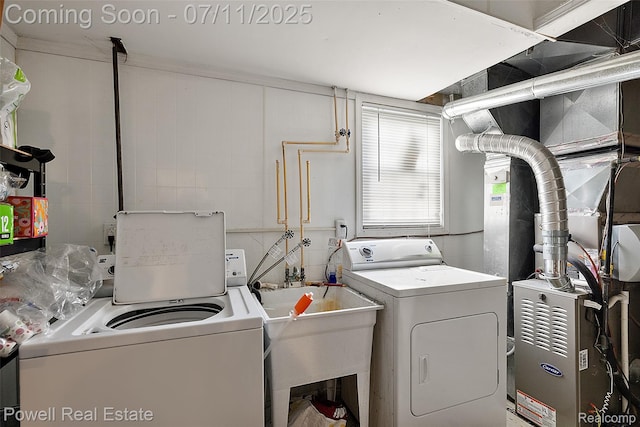 2601 Eardman Ct, Westland, MI 48186 - laundry area featuring washer and dryer and heating unit
