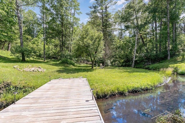 1873 Sanderson Rd, Prescott, MI 48756 - dock area with a yard