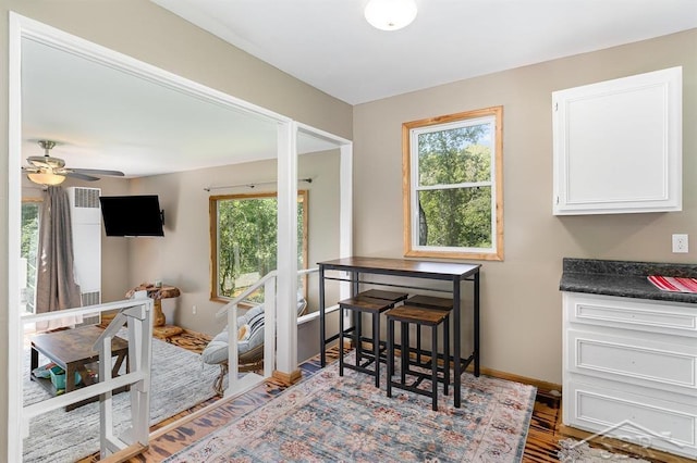 1873 Sanderson Rd, Prescott, MI 48756 - dining room with wood finished floors and a ceiling fan