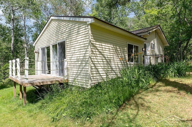 1873 Sanderson Rd, Prescott, MI 48756 - view of side of property featuring a wooden deck
