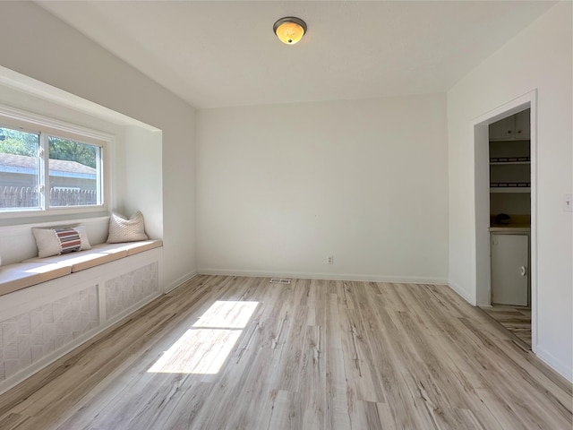 1006 Madison St, Three Rivers, MI 49093 - empty room with light wood finished floors and baseboards