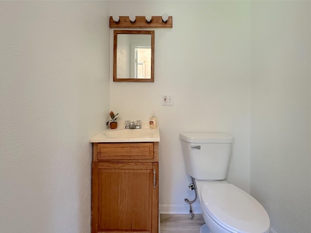 1006 Madison St, Three Rivers, MI 49093 - bathroom featuring toilet and vanity