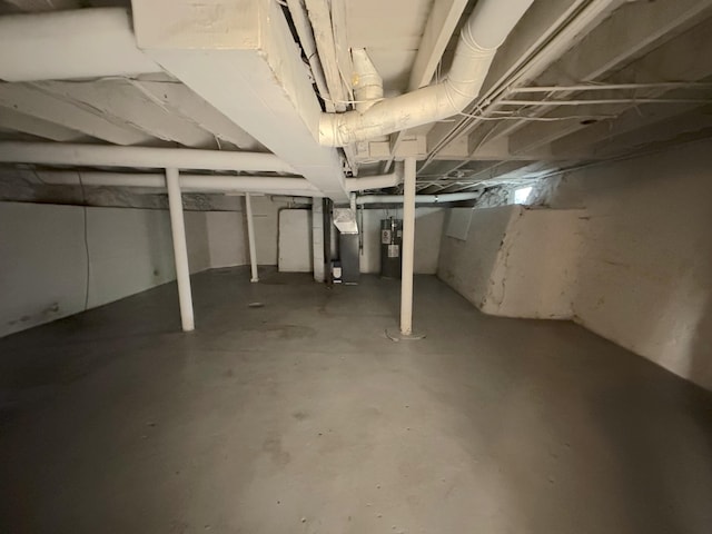 1006 Madison St, Three Rivers, MI 49093 - unfinished below grade area featuring water heater