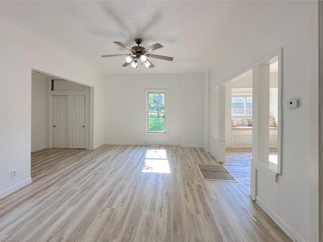 1006 Madison St, Three Rivers, MI 49093 - spare room featuring healthy amount of natural light, a ceiling fan, and light wood-style floors