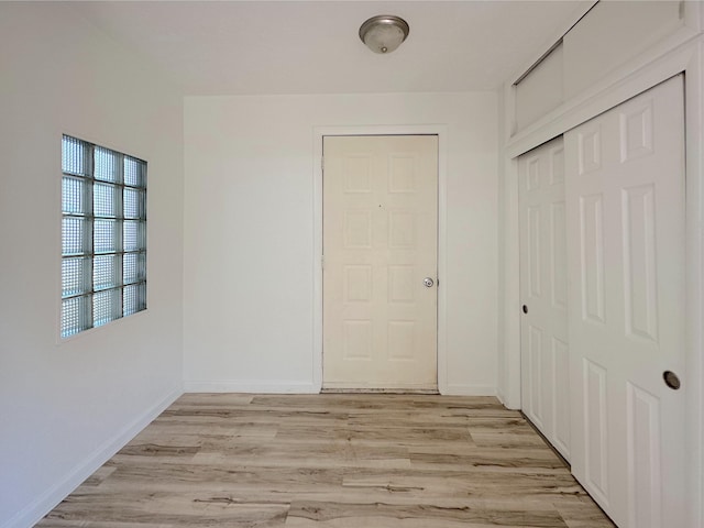 1006 Madison St, Three Rivers, MI 49093 - hallway with light wood-style floors