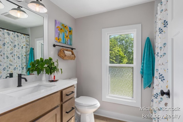 10840 Harvard Ave NE, Rockford, MI 49341 - bathroom featuring vanity and wood finished floors