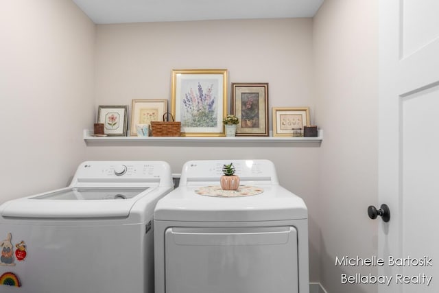 10840 Harvard Ave NE, Rockford, MI 49341 - washroom with separate washer and dryer