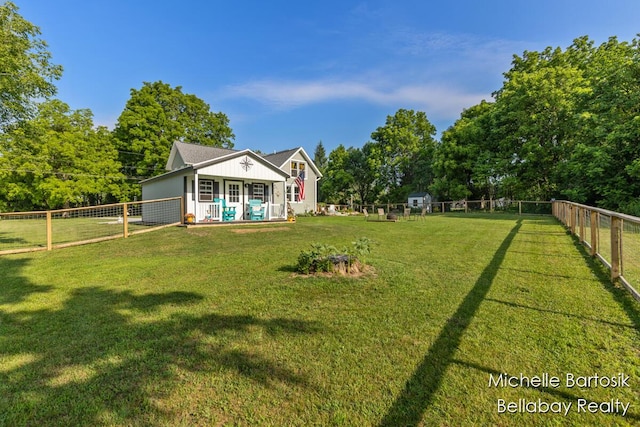 10840 Harvard Ave NE, Rockford, MI 49341 - view of front of house with a fenced backyard
