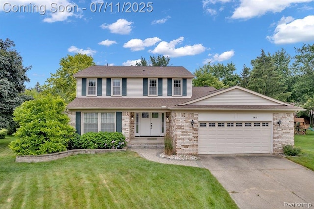 3417 Palm Aire Ct, Rochester Hills, MI 48309 - view of front of house with an attached garage, a front lawn, brick siding, and driveway