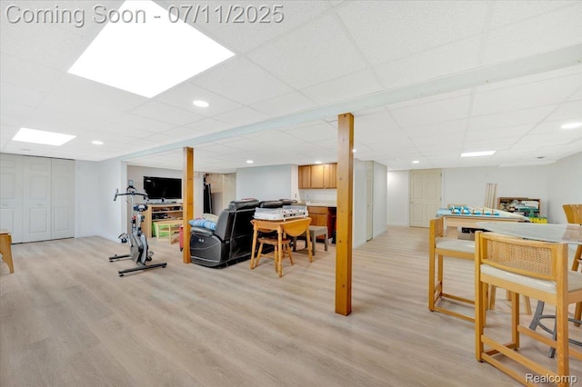 3417 Palm Aire Ct, Rochester Hills, MI 48309 - workout area with light wood-style floors and a paneled ceiling