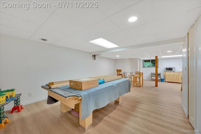 3417 Palm Aire Ct, Rochester Hills, MI 48309 - recreation room with light wood-type flooring and a drop ceiling