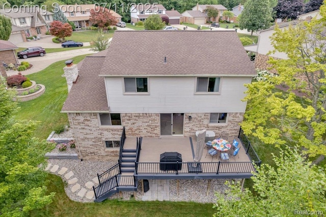 3417 Palm Aire Ct, Rochester Hills, MI 48309 - back of property featuring brick siding, a wooden deck, stairway, a yard, and roof with shingles