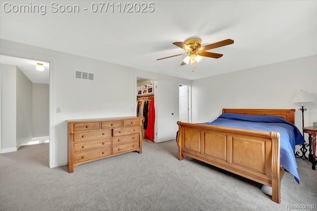 3417 Palm Aire Ct, Rochester Hills, MI 48309 - bedroom with light carpet, ceiling fan, and a closet