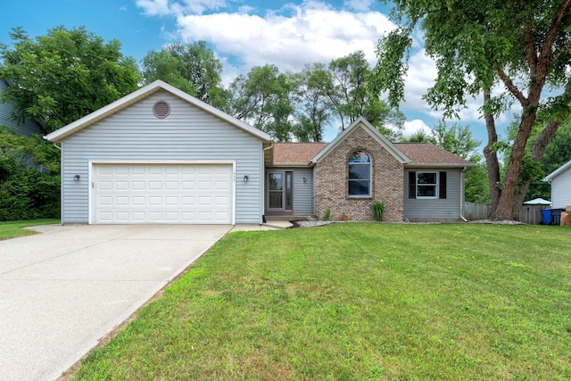 1428 Sherry Dr, Portage, MI 49024 - single story home featuring concrete driveway, a garage, brick siding, and roof with shingles