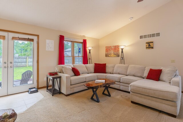 1428 Sherry Dr, Portage, MI 49024 - tiled living room featuring lofted ceiling and french doors