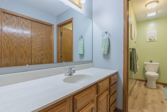 1428 Sherry Dr, Portage, MI 49024 - bathroom featuring wood finished floors and vanity